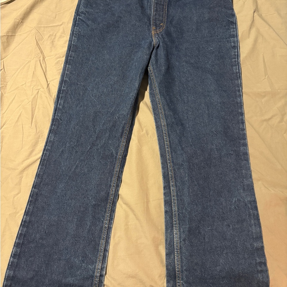 orange tag levi’s dark wash